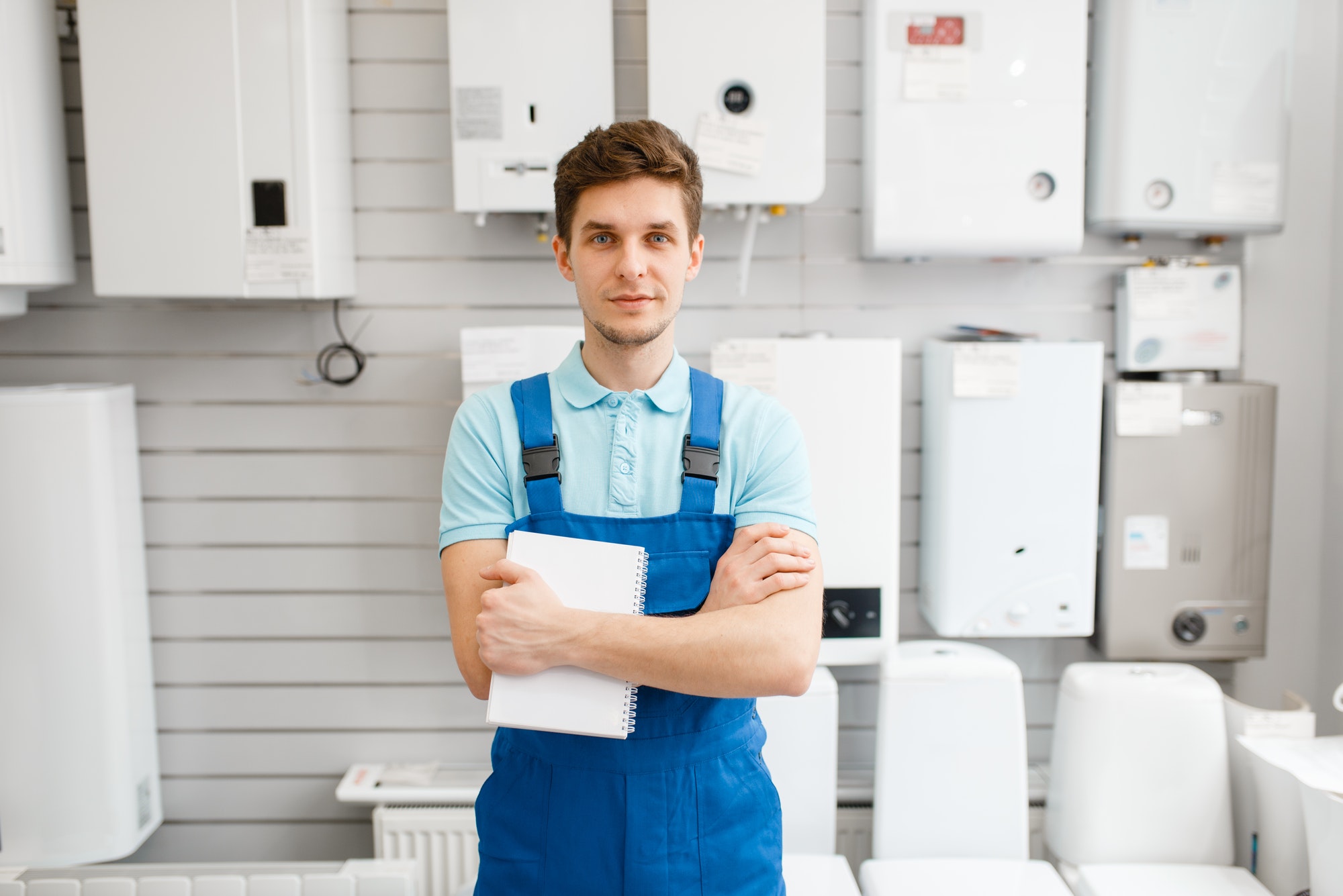 emergency assistance, plumber at showcase with boilers in NJ